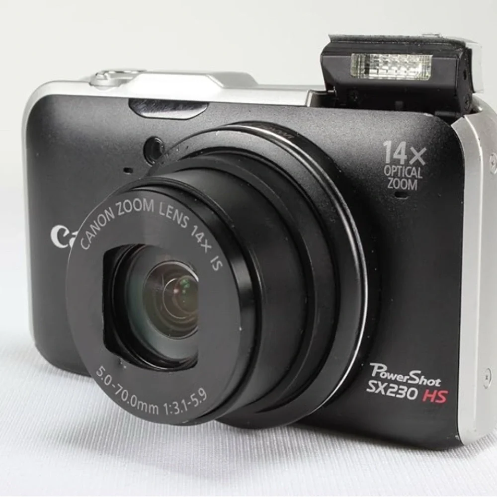 Canon Black Digital Camera with Zoom Lens and LCD Screen